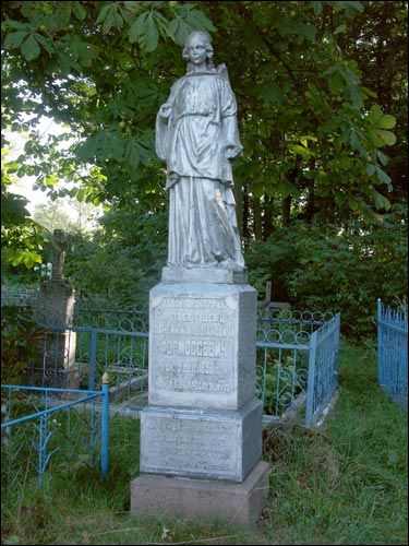 - Cerkiew Podwyższenia Krzyża Świętego. Pomnik nagrobny na cmentarzu przy cerkwi. Foto 08/2005